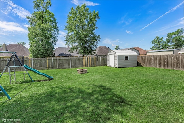 181 Bent Tree Loop, Haughton, LA 71037 - view of yard featuring a playground and a fire pit