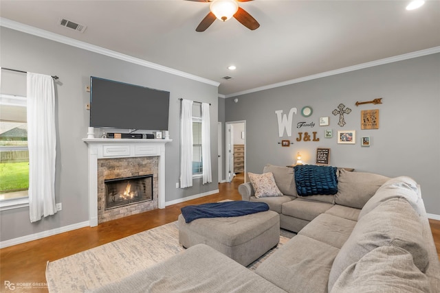 181 Bent Tree Loop, Haughton, LA 71037 - living room featuring a ceiling fan, crown molding, baseboards, a stone fireplace, and recessed lighting
