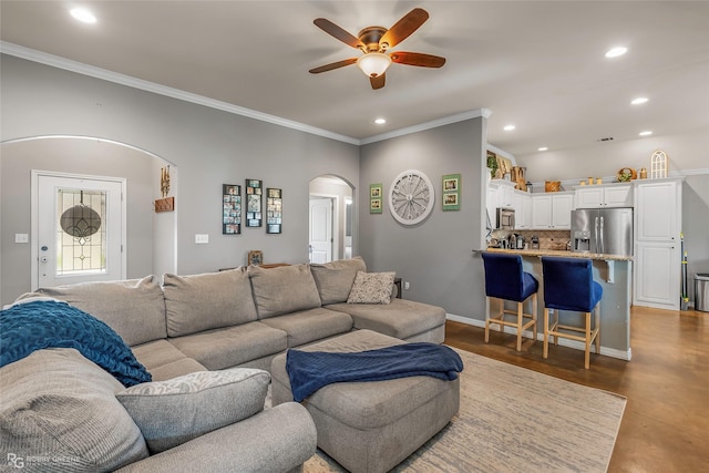 181 Bent Tree Loop, Haughton, LA 71037 - living room featuring arched walkways, ceiling fan, recessed lighting, crown molding, and baseboards
