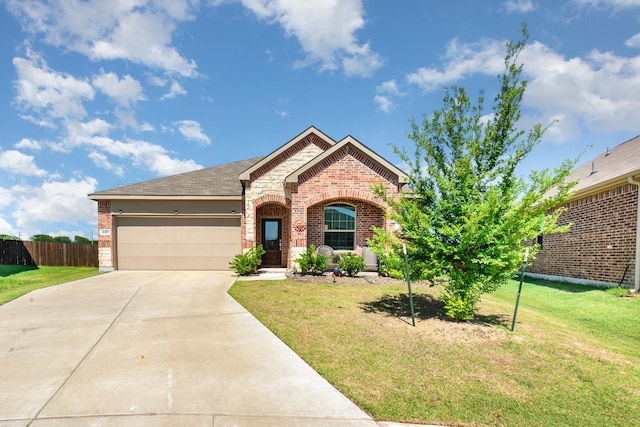 5201 Rockrose Ln, Princeton, TX 75407 - view of front of property featuring brick siding, driveway, and an attached garage