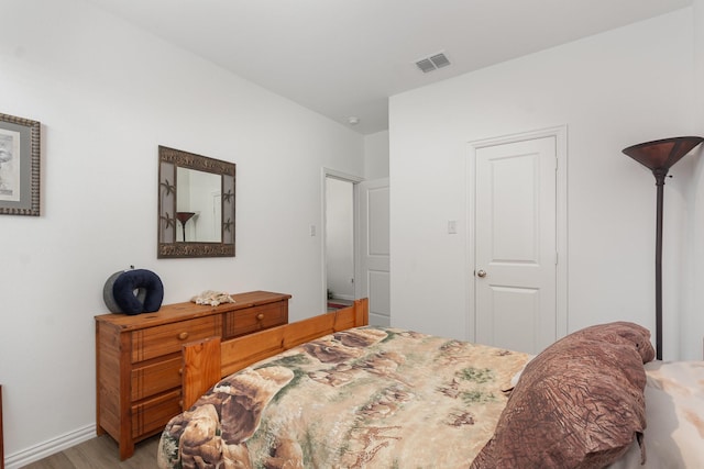 5201 Rockrose Ln, Princeton, TX 75407 - bedroom with light wood finished floors and baseboards