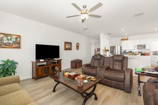 5201 Rockrose Ln, Princeton, TX 75407 - living room featuring light wood finished floors, a ceiling fan, recessed lighting, and baseboards
