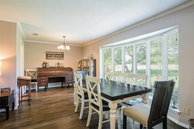 6710 Eastview Dr, Sachse, TX 75048 - dining room with crown molding, a chandelier, dark wood finished floors, and baseboards