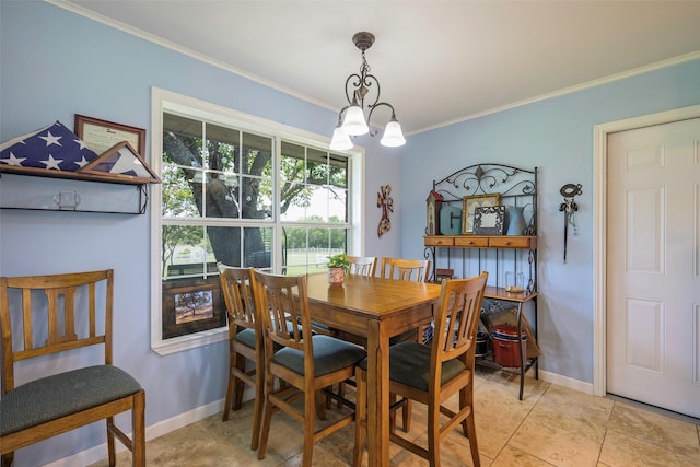 6710 Eastview Dr, Sachse, TX 75048 - dining room featuring ornamental molding, baseboards, a chandelier, and light tile patterned flooring