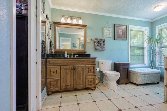 6710 Eastview Dr, Sachse, TX 75048 - full bath with vanity, crown molding, toilet, and a textured ceiling