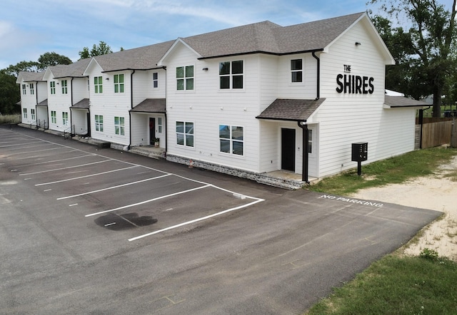 18747 Fm 2493, Flint, TX 75762 - view of front facade with uncovered parking and roof with shingles