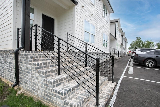 18747 Fm 2493, Flint, TX 75762 - view of side of home featuring uncovered parking and stairway
