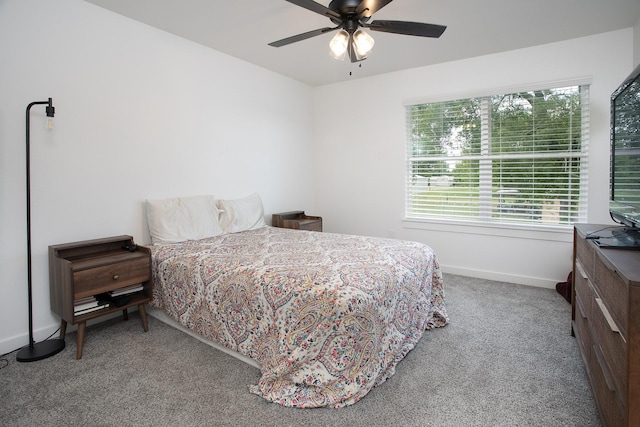 18747 Fm 2493, Flint, TX 75762 - carpeted bedroom with multiple windows, baseboards, and a ceiling fan