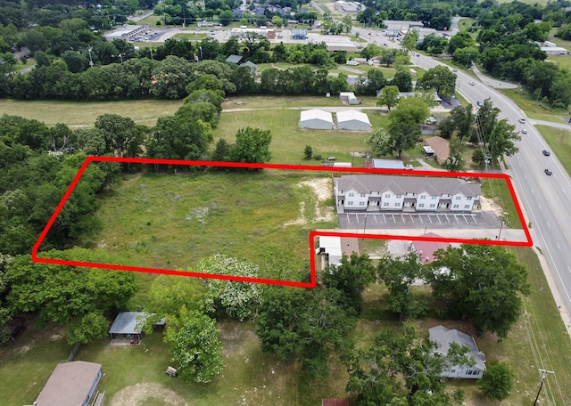 18747 Fm 2493, Flint, TX 75762 - aerial view of property and surrounding area with property boundaries highlighted and a tree filled landscape