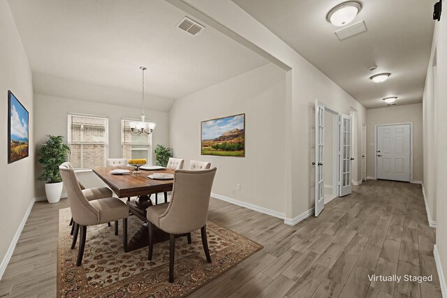 906 Silverbell St, Princeton, TX 75407 - dining room featuring light wood-type flooring and a chandelier