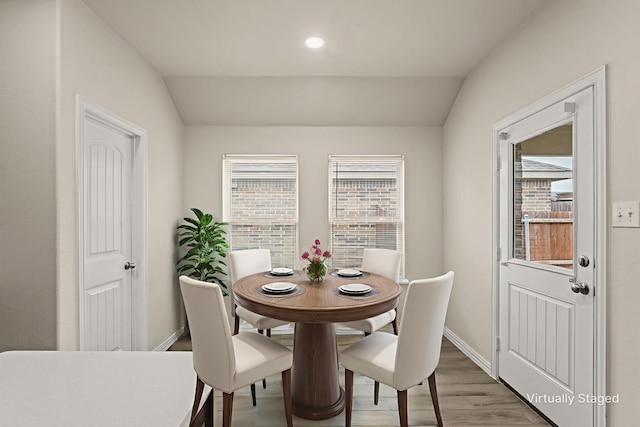 906 Silverbell St, Princeton, TX 75407 - dining area featuring lofted ceiling and light wood-style flooring