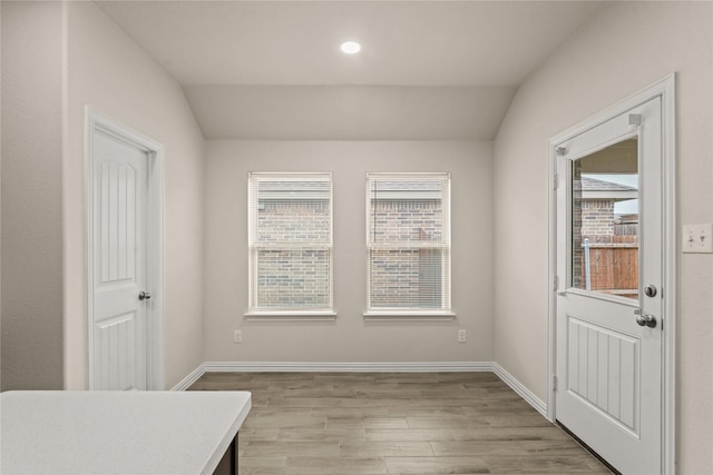906 Silverbell St, Princeton, TX 75407 - unfurnished dining area with light wood-type flooring, healthy amount of natural light, vaulted ceiling, and recessed lighting
