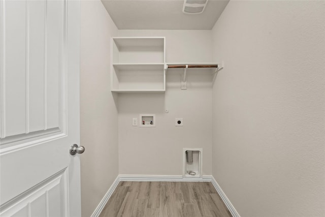 906 Silverbell St, Princeton, TX 75407 - washroom with hookup for an electric dryer, washer hookup, light wood-type flooring, and hookup for a gas dryer