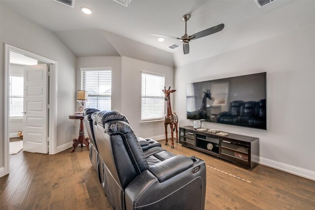 8977 George Cayley Ln, Frisco, TX 75034 - living room featuring a ceiling fan, baseboards, lofted ceiling, wood finished floors, and recessed lighting