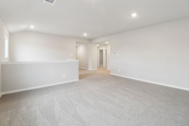 901 Lily Ln, Lavon, TX 75166 - unfurnished room featuring recessed lighting, light carpet, baseboards, and vaulted ceiling