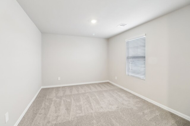 901 Lily Ln, Lavon, TX 75166 - empty room featuring light colored carpet, baseboards, and recessed lighting