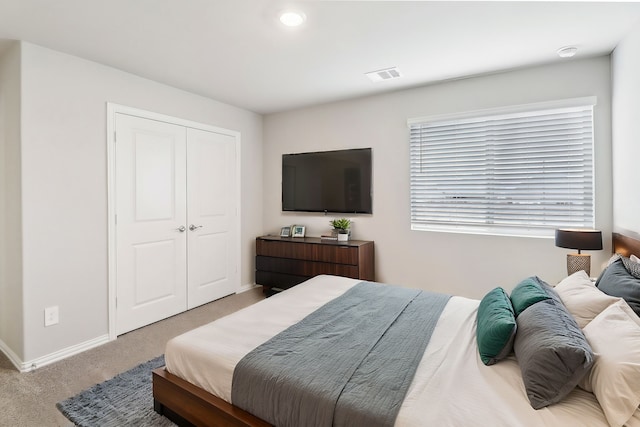 901 Lily Ln, Lavon, TX 75166 - carpeted bedroom featuring baseboards and a closet