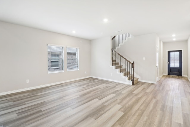 901 Lily Ln, Lavon, TX 75166 - foyer entrance with stairs, light wood-style floors, recessed lighting, and baseboards