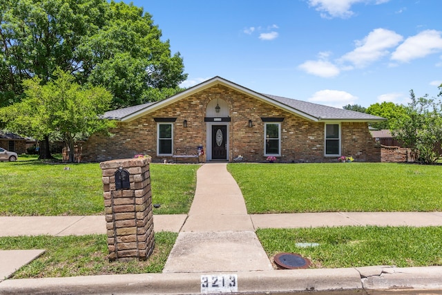3213 Kingsbridge Dr, Plano, TX 75075 - single story home with brick siding and a front yard