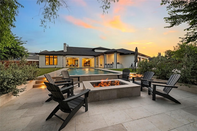 3313 Jackson Ct, Grapevine, TX 76092 - view of patio / terrace featuring a fire pit and an outdoor pool