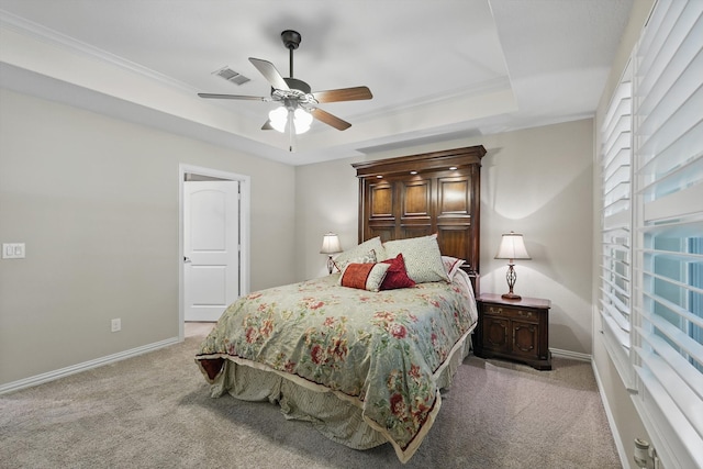 8829 Cantina Bay Ln, Frisco, TX 75036 - bedroom featuring light carpet, a raised ceiling, baseboards, a ceiling fan, and crown molding
