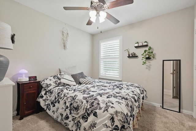 8829 Cantina Bay Ln, Frisco, TX 75036 - bedroom featuring light carpet, baseboards, and a ceiling fan