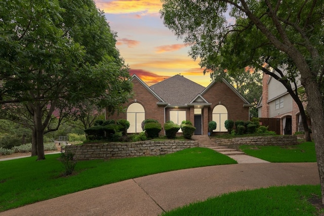 3400 Parr Rd, Grapevine, TX 76051 - view of front of home featuring brick siding, a front lawn, and a shingled roof
