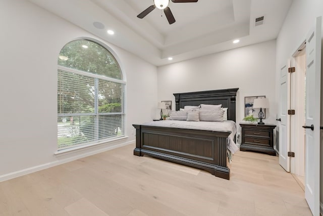 3400 Parr Rd, Grapevine, TX 76051 - bedroom featuring light wood-type flooring, recessed lighting, a raised ceiling, and ceiling fan