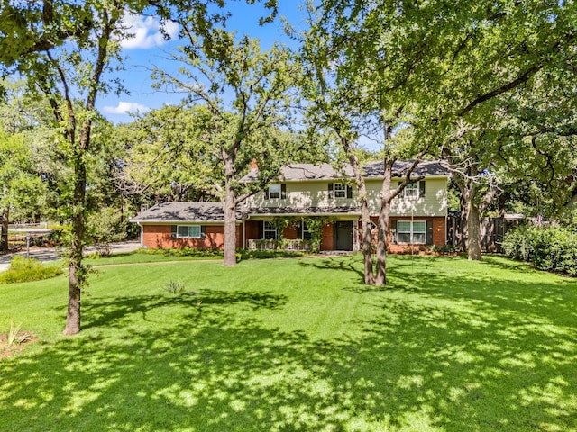 1432 Cimarron Trl, Hurst, TX 76053 - back of property with brick siding
