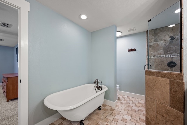 1432 Cimarron Trl, Hurst, TX 76053 - full bathroom with a soaking tub, tiled shower, stone tile flooring, baseboards, and recessed lighting
