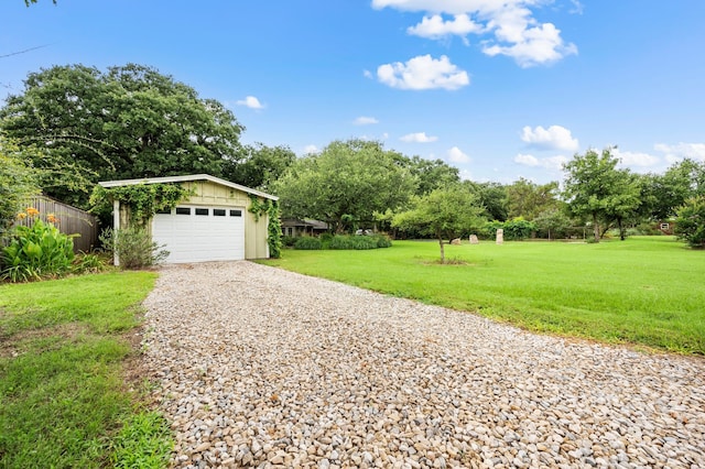 1432 Cimarron Trl, Hurst, TX 76053 - detached garage with gravel driveway and view of scattered trees