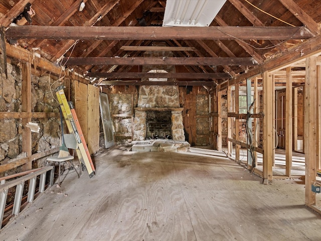 203 E 9th St, Shady Shores, TX 76208 - miscellaneous room with a stone fireplace and vaulted ceiling