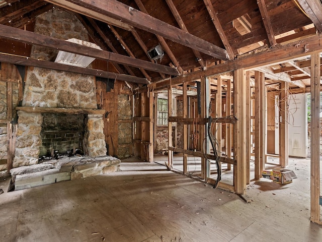 203 E 9th St, Shady Shores, TX 76208 - misc room featuring vaulted ceiling, a fireplace, and plenty of natural light