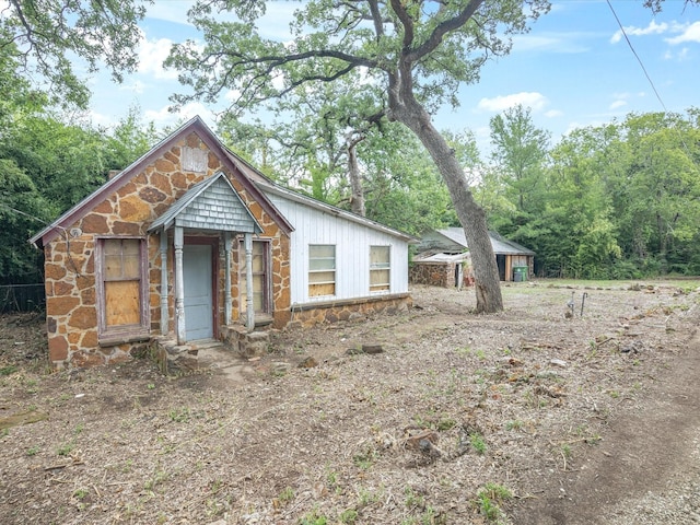 203 E 9th St, Shady Shores, TX 76208 - view of front of property with stone siding