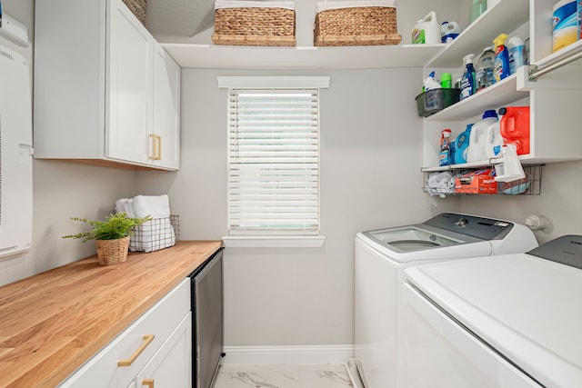 4258 Sechrist Dr, Frisco, TX 75034 - laundry room with washer and clothes dryer, light marble finish floors, cabinet space, and a heating unit