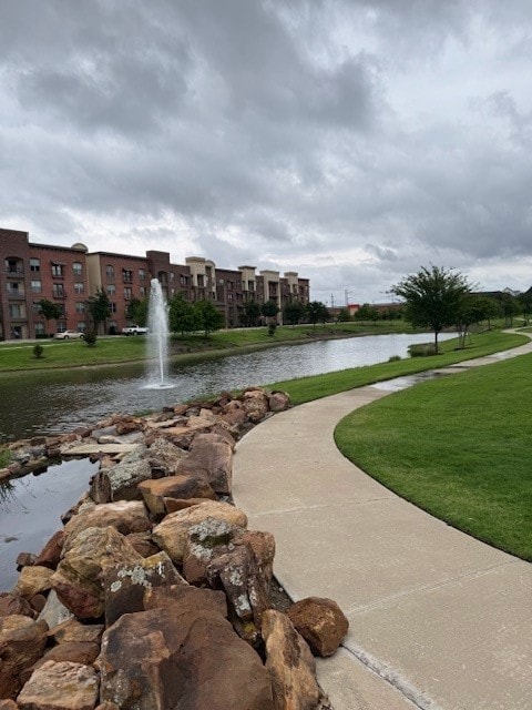 4258 Sechrist Dr, Frisco, TX 75034 - view of property's community with a yard and a water view
