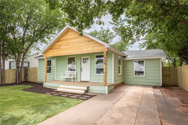 1534 Burger St, Abilene, TX 79603 - view of front facade with a porch and a shingled roof