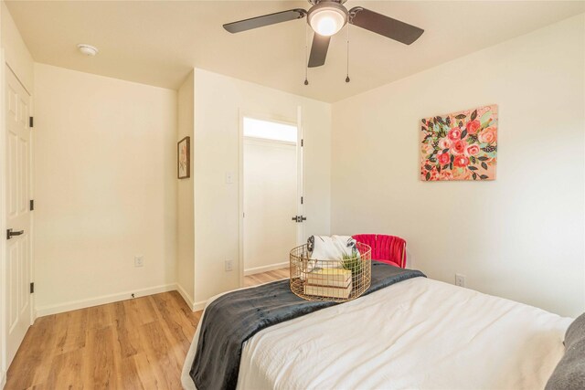 1534 Burger St, Abilene, TX 79603 - bedroom with light wood-type flooring, baseboards, and a ceiling fan