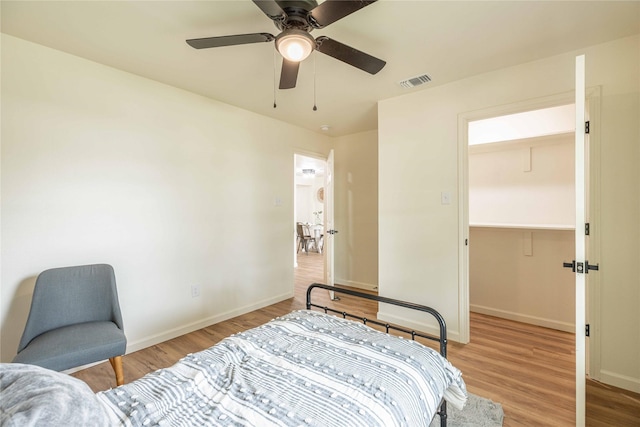 1534 Burger St, Abilene, TX 79603 - bedroom featuring wood finished floors, baseboards, and a spacious closet