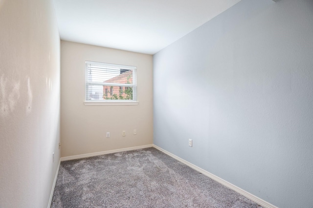 2205 Canton St Unit 107, Dallas, TX 75201 - carpeted empty room with baseboards