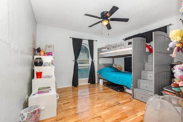 801 Daventry Dr, Garland, TX 75040 - bedroom featuring wood finished floors and a ceiling fan