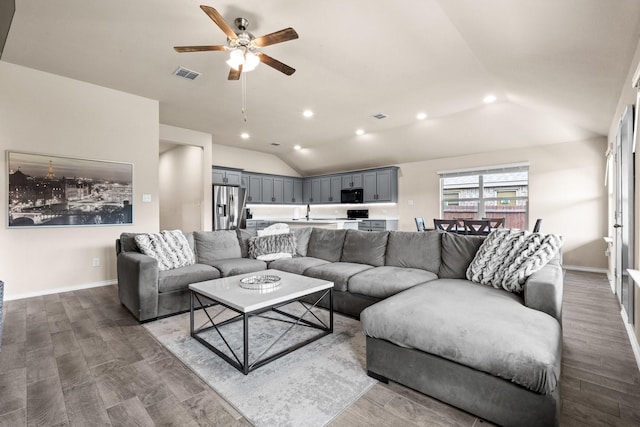 3216 Maroon Creek Rd, Aubrey, TX 76227 - living area featuring lofted ceiling, recessed lighting, ceiling fan, wood finished floors, and baseboards