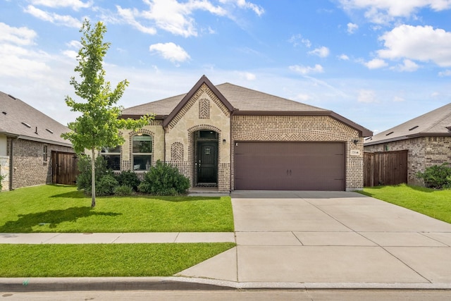 3216 Maroon Creek Rd, Aubrey, TX 76227 - view of front of home featuring brick siding, driveway, and an attached garage