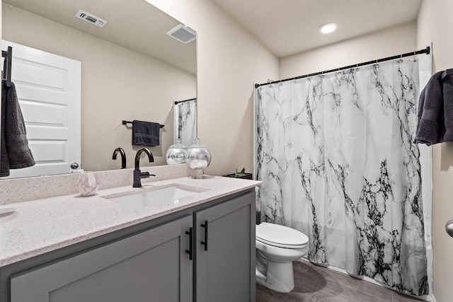 3216 Maroon Creek Rd, Aubrey, TX 76227 - full bath featuring vanity, toilet, curtained shower, and wood finished floors