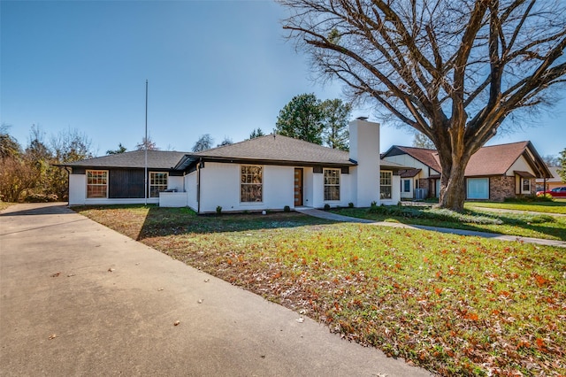 2028 Casa Loma Ct, Grapevine, TX 76051 - ranch-style house featuring a chimney and a front lawn