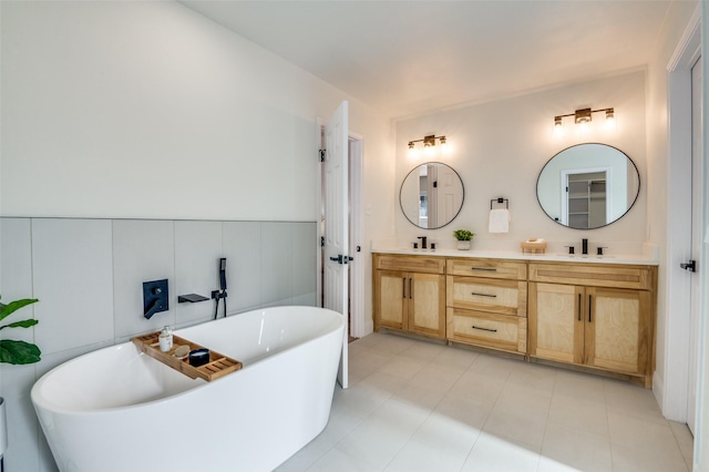 2028 Casa Loma Ct, Grapevine, TX 76051 - bathroom with double vanity and a freestanding tub