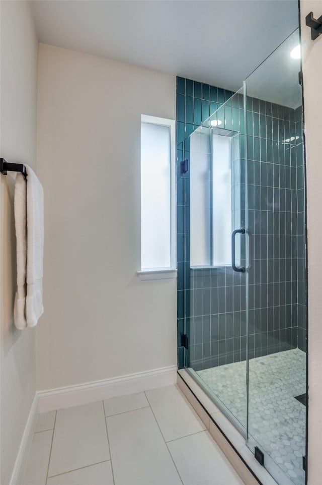 2028 Casa Loma Ct, Grapevine, TX 76051 - bathroom with tile patterned flooring, a shower stall, and baseboards