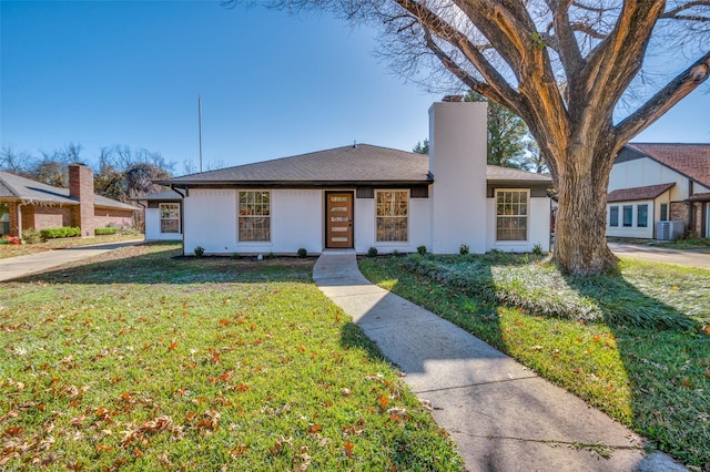 2028 Casa Loma Ct, Grapevine, TX 76051 - view of front of property featuring a chimney, cooling unit, and a front lawn