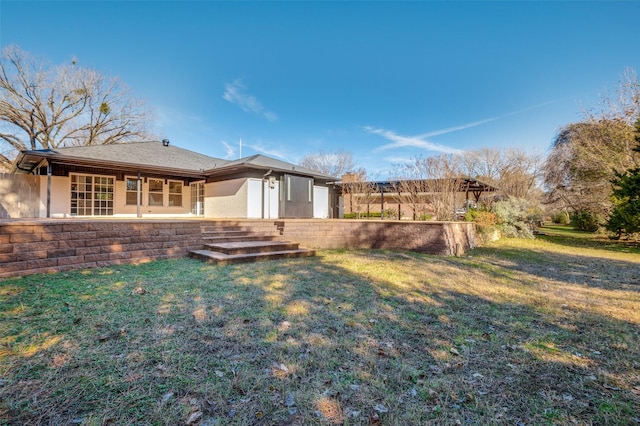 2028 Casa Loma Ct, Grapevine, TX 76051 - rear view of house featuring a yard and stucco siding