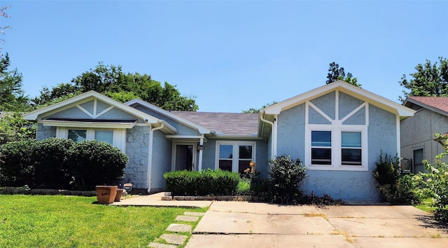1718 Gentle Wind Dr, Arlington, TX 76018 - ranch-style home with stucco siding, a front lawn, and stone siding